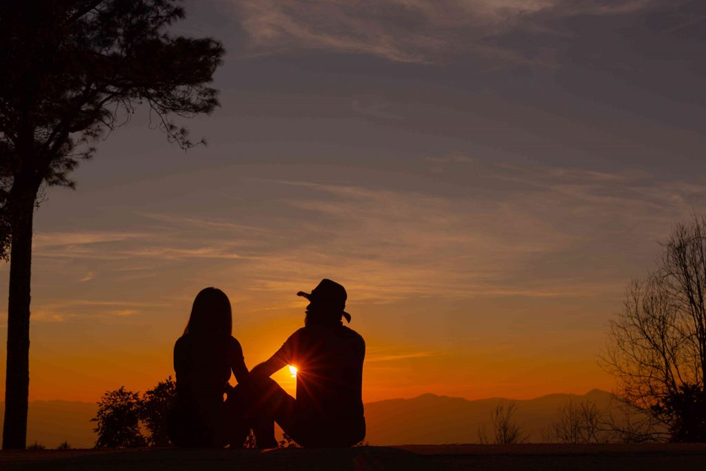 romantic sunset and couple