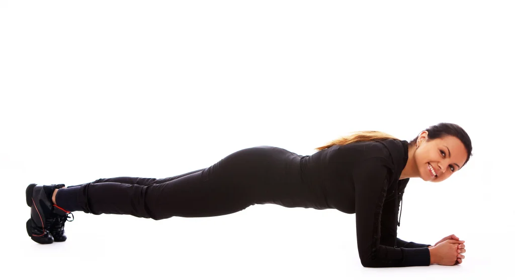 woman doing elbow plank for core strength