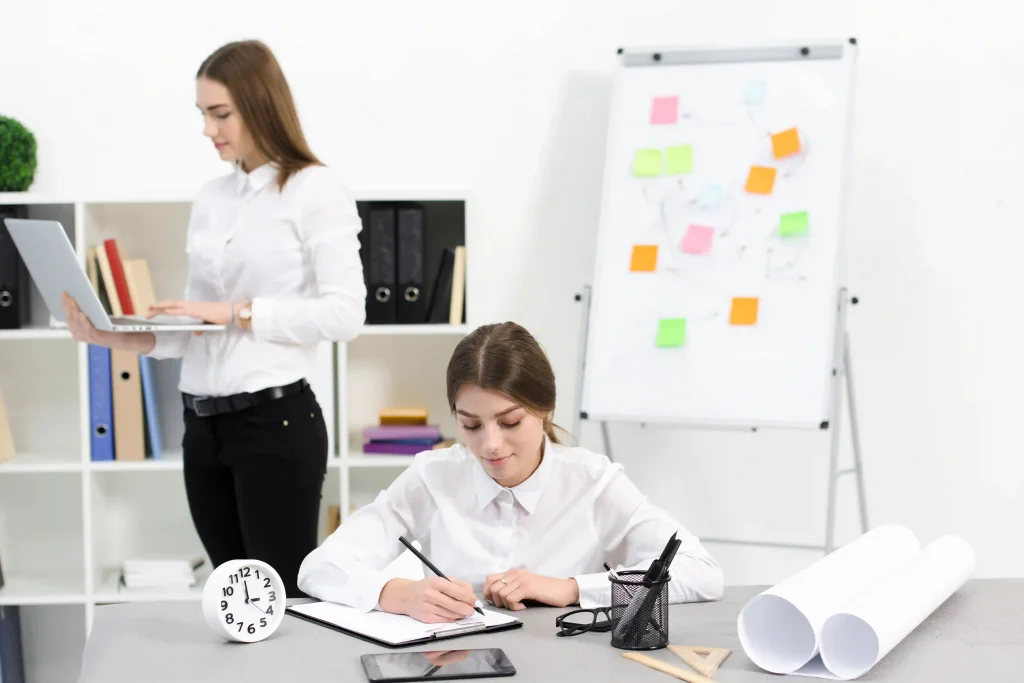 woman with dyslexia using sticky notes to organize her tasks